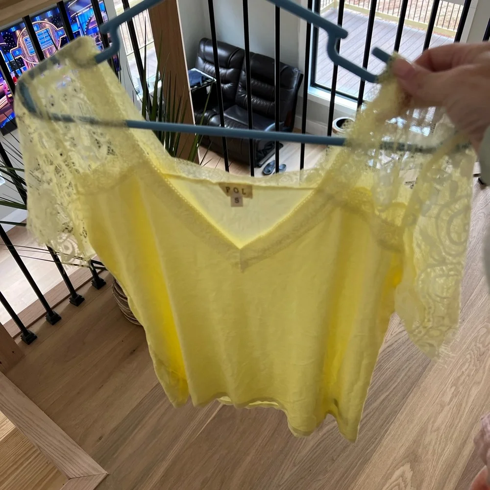 Yellow size small Pol shirt, true to size with some stretch. - Picture 2 of 4
